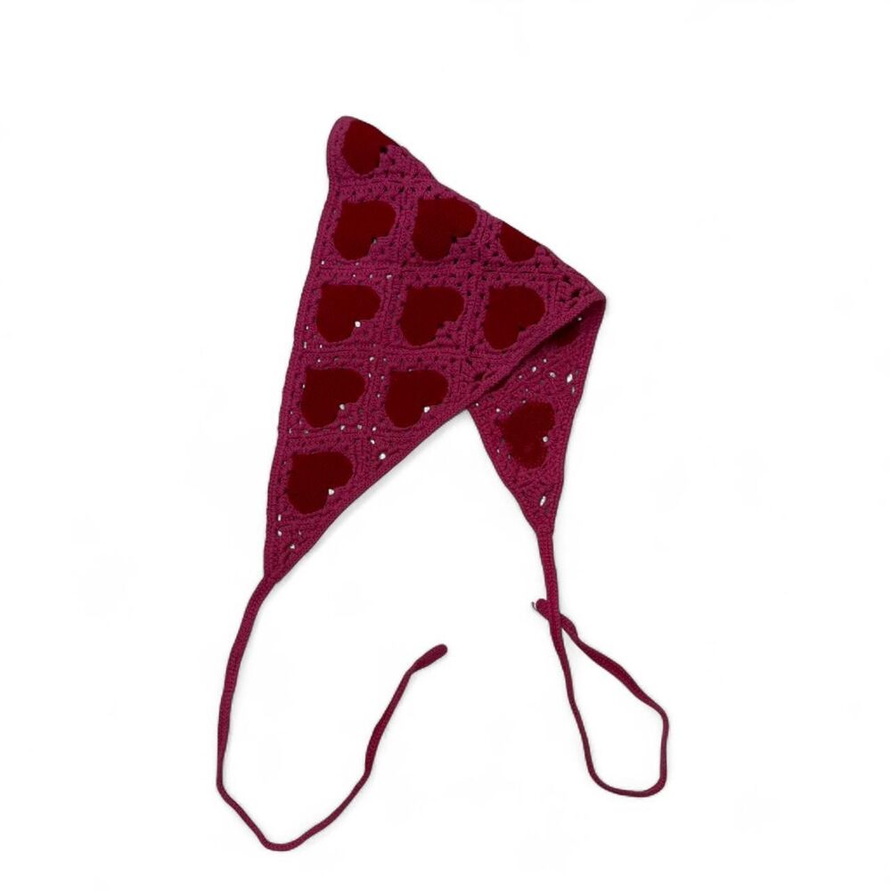 Pink crochet  accessory with red hearts